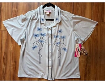 Blusa vintage Trissi de manga corta de georgette transparente, talla LRG 40, con estampado floral azul