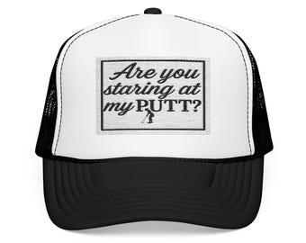Golfing hat with funny saying of Are you staring at my Putt