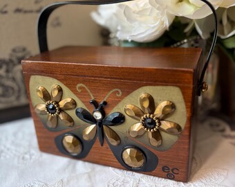 Borsa in legno con farfalla Flutter bye di Enid Collins del Texas