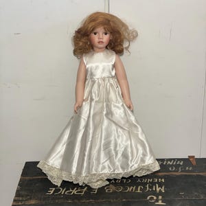Treasured Heirloom Collection Janis Berard porcelain doll brown hair