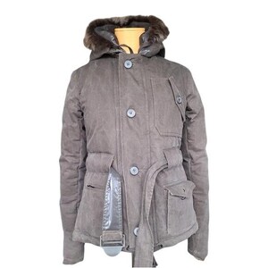 May include: A brown winter jacket with a fur-lined hood. The jacket has a button-up front, multiple pockets, and a belt. The jacket is made of a durable material and is designed for cold weather.
