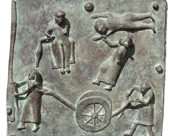 Painel de portas antigas em bronze fundido da Basílica de San Zeno, representando Adão e Eva, Caim e Abel.