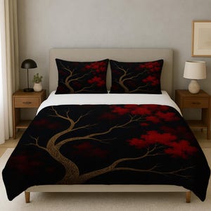 May include: A black and red bedding set featuring a tree design. The comforter and two pillowcases display a stylized tree with red leaves against a black background. The tree trunk and branches are a golden color.