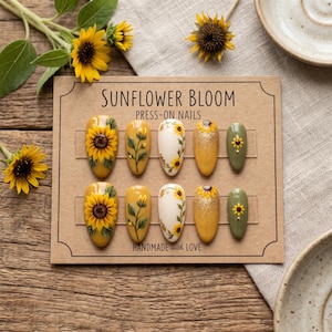 Pressnaglar med solrosblommor, handgjord blommig nagelkonst, gula och salviagröna naglar, höstmanikyr i Cottagecore