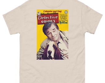 Op de afbeelding: Een vintage comicboekomslag met een man en een hond. De omslag is geel met rode en zwarte tekst. De tekst luidt "Columbo and Dog Detective Comics" en "Introducing a Sensational New Team of Partners in Peril - The Homes of Mystery - The Riddler!"