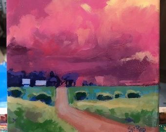 May include: A painting of a country road leading into a field with a pink and purple sky in the background. The road is dirt and the field is green. There are trees on either side of the road. The sky is painted with thick brushstrokes. The painting is signed "Svi Rad" in the bottom right corner.