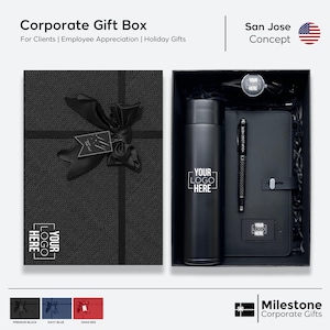 May include: A black gift box with a black ribbon and bow. The box contains a black water bottle, a black pen, and a black notebook. The box is labeled "Your Logo Here".