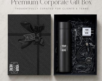 May include: A black gift box set containing a matte black insulated tumbler, a black pen, a white power adapter, and a black charging cable. The box lid features a black ribbon and the text "Premium Corporate Gift Box" and "YOUR LOGO HERE".