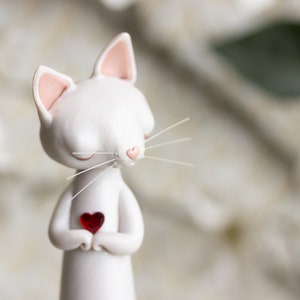 White Cat with a Heart image 3