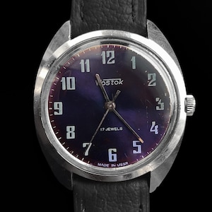 May include: A set of three ceramic mugs with a speckled, matte finish in cream, light grey, and dark grey. Each mug has a simple, modern design, suitable for coffee or tea.