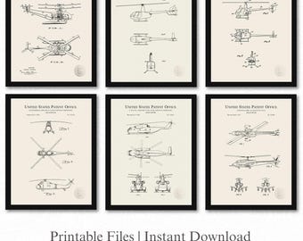 Op de afbeelding: Zes ingelijste vintage helikopter patent prints. Elke print toont gedetailleerde zwart-wit technische tekeningen van verschillende helikopterontwerpen. De prints worden weergegeven op een crèmekleurige achtergrond met de tekst "UNITED STATES PATENT OFFICE" bovenaan.