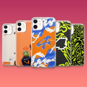 May include: Five different phone cases with various designs. The cases are clear and show the phone's design underneath. One case features a cartoon driver with a crown, another has a blue and orange abstract design with the number 4, another has a black and green abstract design with the number 4, another has a black and green abstract design with a pattern of circles, and the last case has a white background with the text "Drive Like, Be Kind".