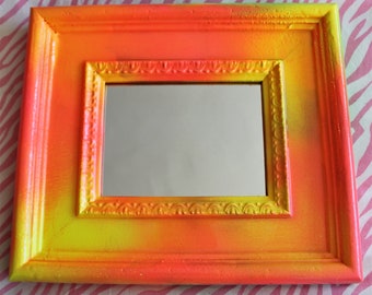 Decorative wall mirror hand painted in bright Neon Oranges and Yellows - high gloss finish
