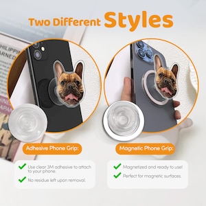 May include: Two phone grips featuring a French Bulldog design. One grip is adhesive and the other is magnetic. Both grips are attached to a smartphone.