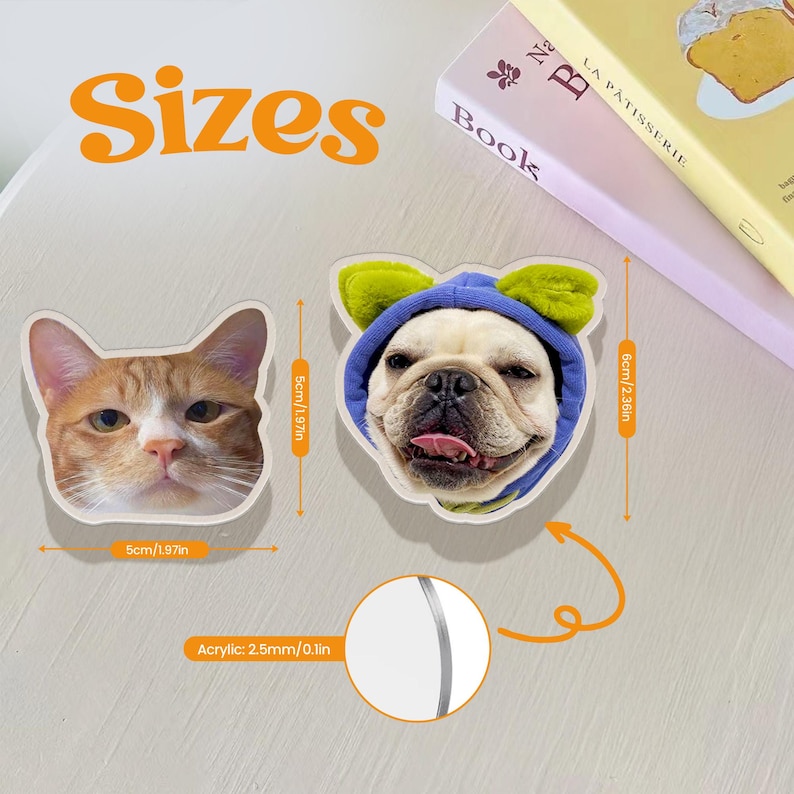 May include: Two acrylic pet portrait keychains, one of a cat and one of a dog. The cat keychain is 5 cm wide and the dog keychain is 6 cm wide. The keychains are made of 2.5 mm thick acrylic.