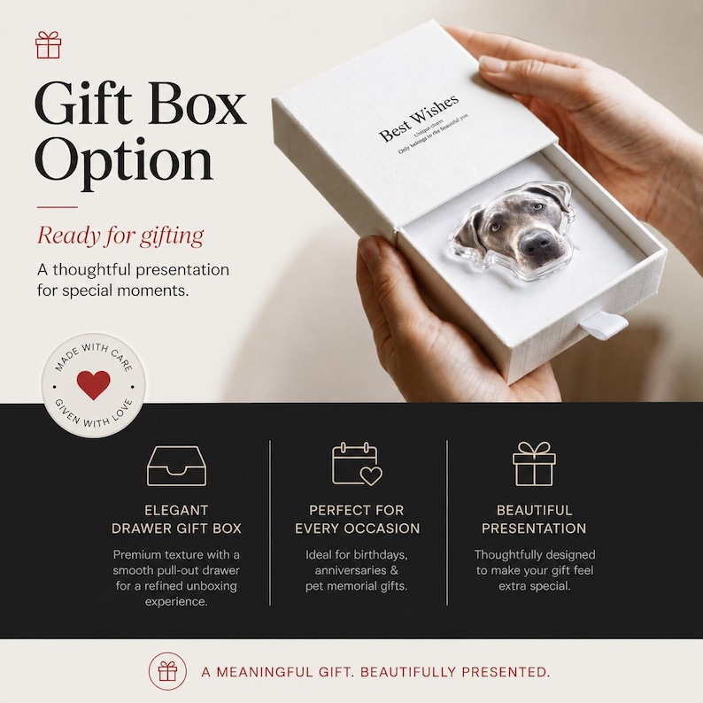 May include: A white rectangular sliding drawer gift box containing a clear acrylic dog portrait charm. The box lid features the text Best Wishes and the interior tray holds the dog charm. The packaging includes a white pull tab on the side.
