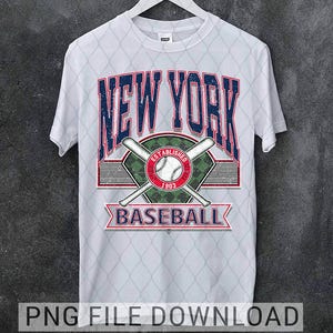 May include: White t-shirt featuring a distressed design with "NEW YORK" in blue and red lettering. The design includes a baseball, crossed bats, and the word "BASEBALL". The shirt is hanging on a white hanger.