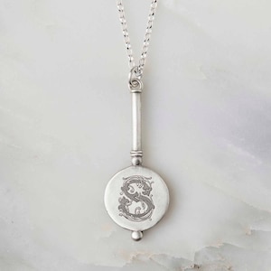 Sterling Silver Initial Monogram Necklace engraved with a single decorative initial and a hidden message engraved on the back