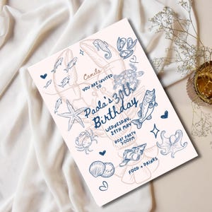 May include: A pale pink birthday invitation featuring blue illustrations of marine life. The invitation text reads "Paola's 30th Birthday", with the date and time of the boat party. The words "FOOD + DRINKS" are also displayed.