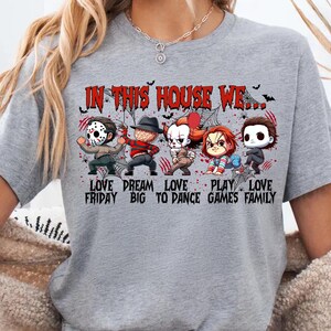 In This House We Love Horror Shirt Funny Halloween Killer Characters Tee Cute Scary Movie Graphic T-Shirt for Women Spooky Family Style