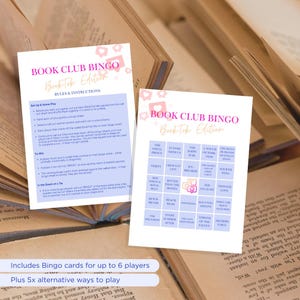 May include: Two white Book Club Bingo cards with pink accents and instructions, set against a backdrop of open books. The cards feature a grid with book titles and the text "BookTok Edition."