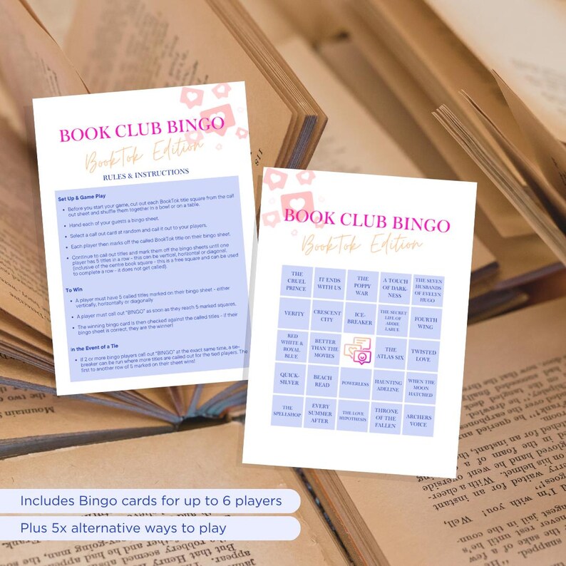 May include: Two white Book Club Bingo cards with pink accents and instructions, set against a backdrop of open books. The cards feature a grid with book titles and the text "BookTok Edition."