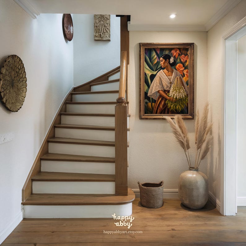 May include: A framed oil painting depicting a person in a white lace blouse holding a bundle of white flowers, displayed on a wall next to a wooden staircase. The artwork features vibrant green foliage and orange floral accents in the background.