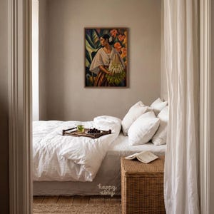 May include: A framed rectangular wall art print featuring a painting of a person in a white lace blouse holding a bundle of white flowers, displayed above a bed with white linens, a bamboo tray with cherries, and a woven wicker bedside table.