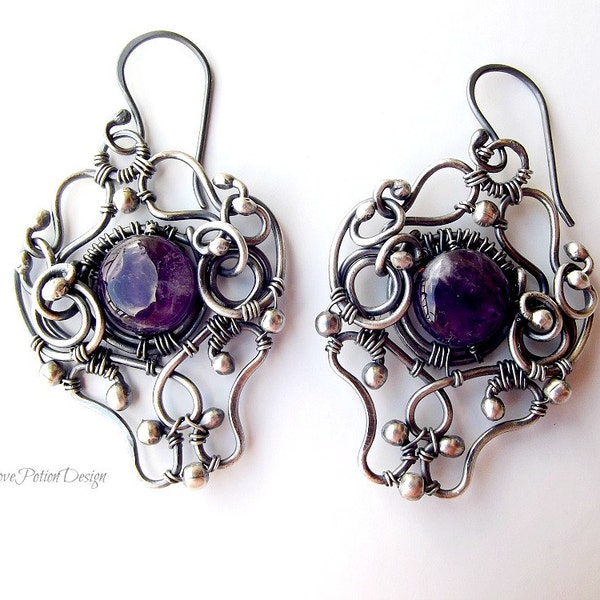 Wire Wrapped Sterling Silver Dangle Earrings With Purple Amethyst.