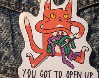 May include: Orange cat with a knife cutting open its own stomach, revealing green and purple intestines. The cat is holding its tail in its other paw. The text "You got to open up" is below the cat.