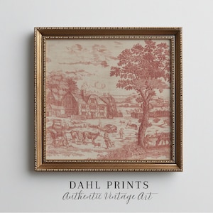 May include: Framed vintage print featuring a pastoral scene in red and cream. The artwork depicts a village with houses, trees, and figures, all within a gold-colored ornate frame. The text "DAHL PRINTS Authentic Vintage Art" is at the bottom.