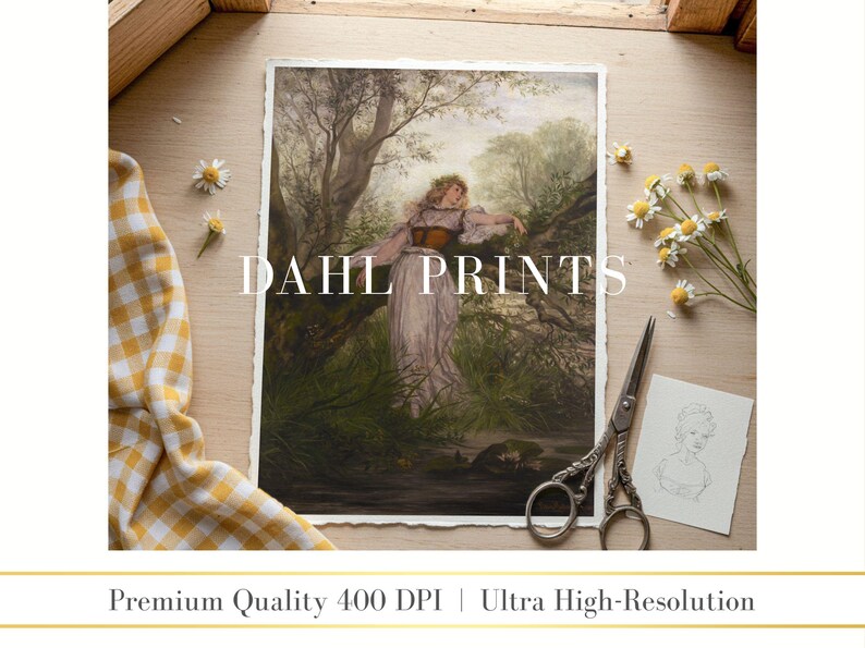 May include: A rectangular art print titled DAHL PRINTS featuring a painting of a person in a long dress and corset standing in a forest. The print has deckled edges and is displayed with metal scissors, a small sketch, and white daisies.