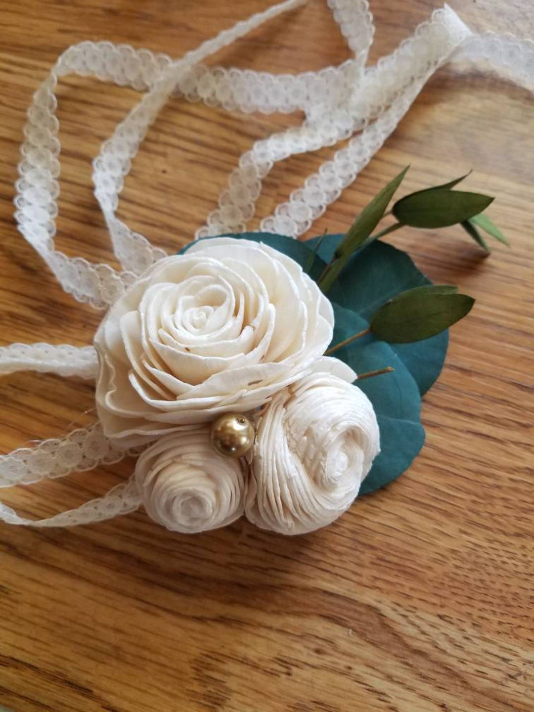 Sola Flower Wrist Corsage With Wooden Rose, Eucalyptus, and Gold Pearl