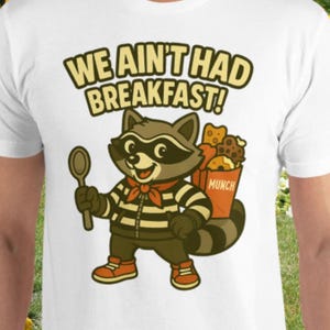 Camiseta divertida de mapache bandido de cereales – Camiseta de animal de dibujos animados que roba bocadillos – Camiseta gráfica adorable para amantes del desayuno – Camiseta con humor culinario de Trash Panda