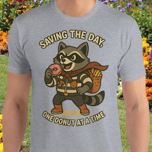 Camiseta divertida de mapache, camiseta gráfica para amantes de las donas, camiseta de dibujos animados de Snack Bandit, camiseta divertida de dona con juego de palabras de comida y animales, superhéroe, Panda de la basura.