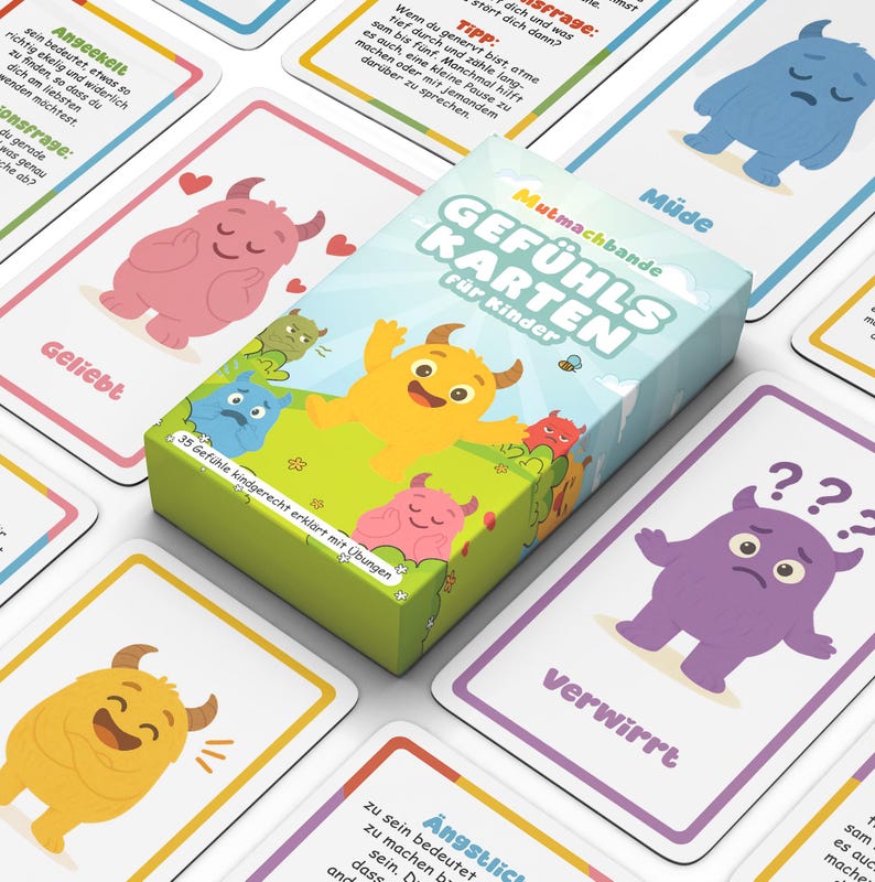 May include: A deck of "Feelings Cards for Children" with a box featuring cartoon monsters. The cards depict various emotions, such as "loved," "confused," and "tired." The box and cards are in a variety of colors, including green, blue, pink, and yellow.