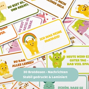 Könnte beinhalten: Eine Sammlung farbenfroher Karten mit Cartoon-Monster-Illustrationen und deutschem Text. Die Karten zeigen verschiedene Designs, darunter Regenbogen, Sonnen und ermutigende Sätze. Der Text "30 Brotdosen - Nachrichten" ist ebenfalls sichtbar.