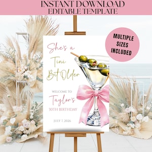 May include: A sign on an easel with the text "She's a Tini Bit Older" and "Welcome to Taylor's 30th Birthday July 7, 2026." A martini glass with olives and a pink bow are featured. The words "Instant Download Editable Template" are at the top.