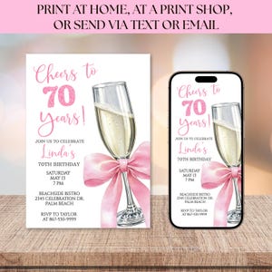 May include: A digital invitation for a 70th birthday celebration. The design features a champagne glass with a pink bow, the text "Cheers to 70 Years!" and event details. The invitation is shown on a card and a smartphone.