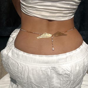 エレガントなシルバーウエストチェーン、トンボの羽のパールウエストチェーン、彼女用ゴールドエンジェルウィングベリーチェーン、Y2Kゴールドウエストチェーン、パールベリーチェーン