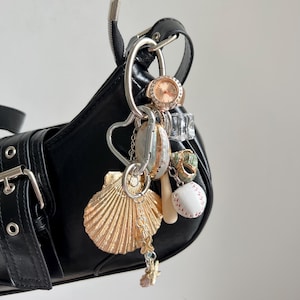 Y2K Gold Uhr Ring Schlüsselbund, Shell Conch Seestern Anhänger Keycharm Accessoire, niedlich Baseball Tasche Charme, Uhr Ring Herz Schloss Zubehör Geschenk