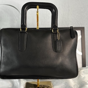 Bolso bandolera delgado vintage de Coach