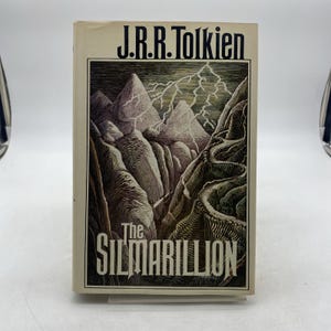 Le Silmarillion par JRR Tolkien HC DJ 1977 1ère édition américaine avec carte