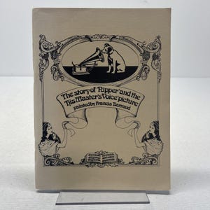 May include: A vintage book cover with the title "The story of 'Ripper' and the His Master's Voice picture" painted by Francis Barraud. The cover features an illustration of a dog listening to a gramophone, with decorative scrollwork.