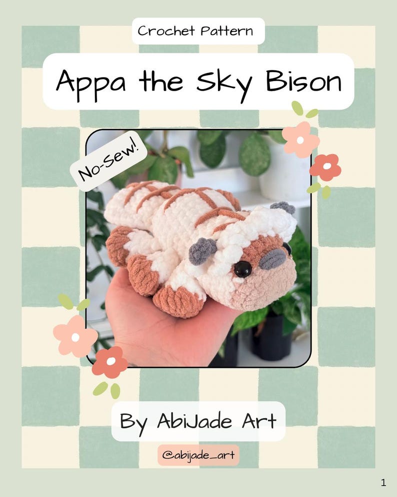 Puede incluir: Una portada de patr&oacute;n de crochet con un peluche de Appa el Bisonte del Cielo. El patr&oacute;n est&aacute; etiquetado como "&iexcl;Sin costura!" e incluye el texto "By AbiJade Art" y el identificador de Instagram "@abijade_art". El fondo tiene un patr&oacute;n de cuadros.