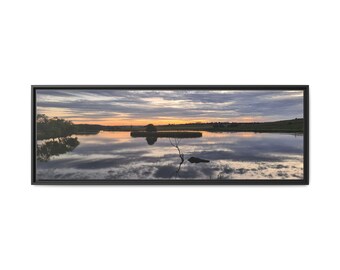 Mirror finish clouds over water