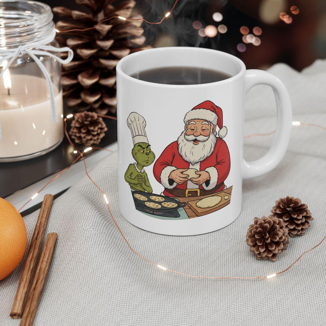 A Fun Santa and Grinch Cooking Arepas Mug, a Christmas Design, Ideal ...