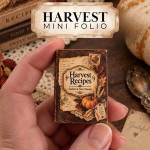 May include: A miniature rectangular folio titled Harvest Recipes with the subtitle Gather & Give Thanks. The cover features a vintage-style design with a pumpkin, wheat stalks, autumn leaves, a postage stamp, and a tag reading Good Food Brighter Days.