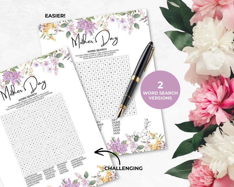 May include: Two Mother's Day word search puzzles with floral accents and the text "Mother's Day". One puzzle is labelled "Easier!" and the other "Challenging". A black and gold pen rests on the puzzles. A pink and white flower arrangement is in the background.