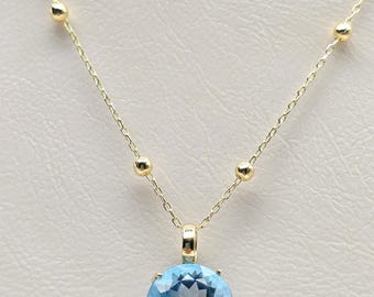 Collana con sfere d'oro, collana con satellite d'oro, collana d'oro con pietra preziosa, pietra portafortuna di novembre, topazio blu